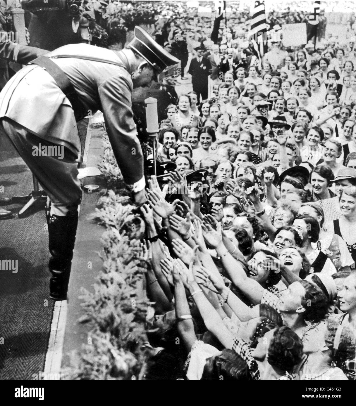 women-cheer-adolf-hitler-1937-C461G3.jpg