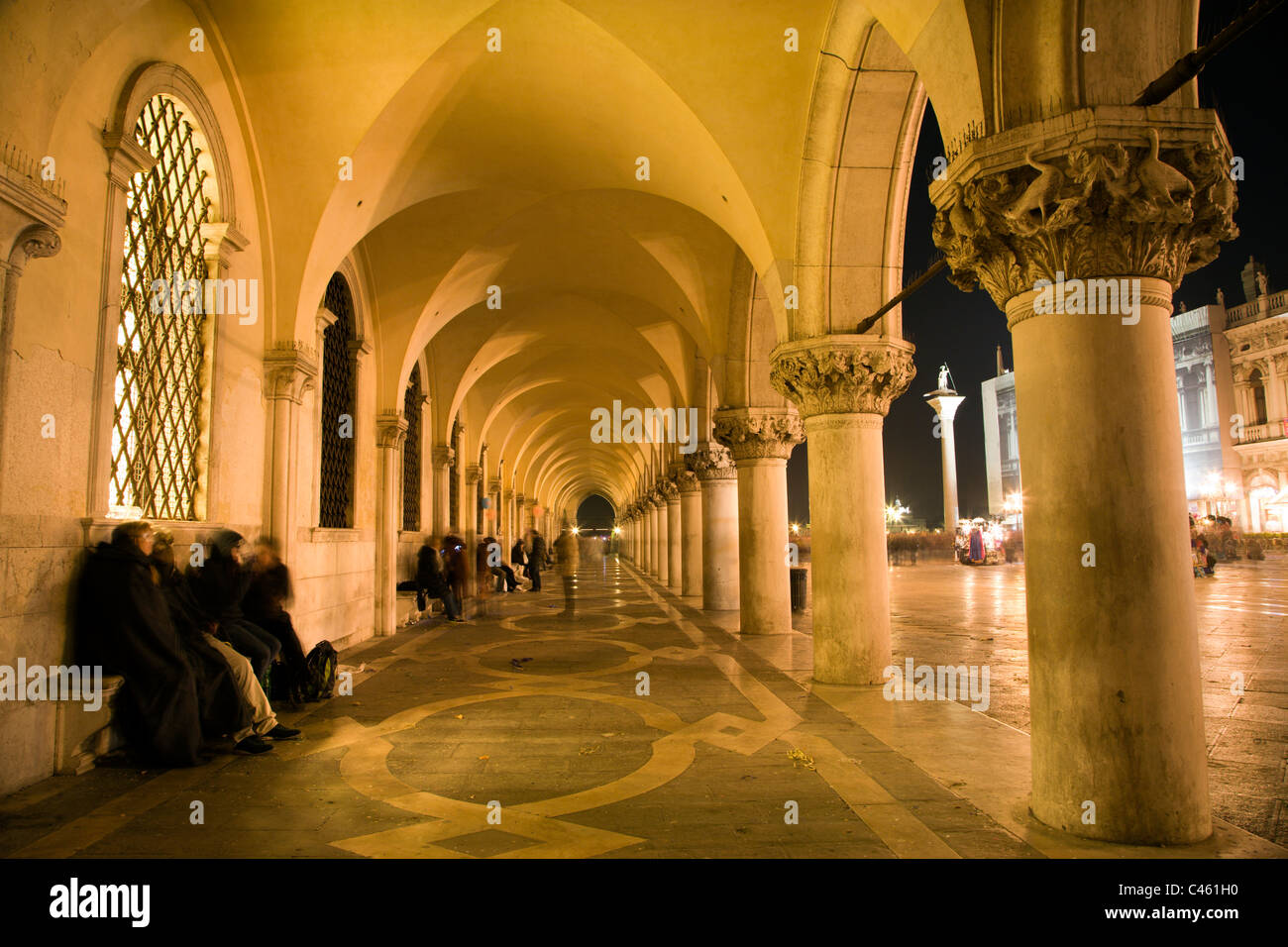 Venice - external corridor of Doge palace in the carnival night Stock Photo