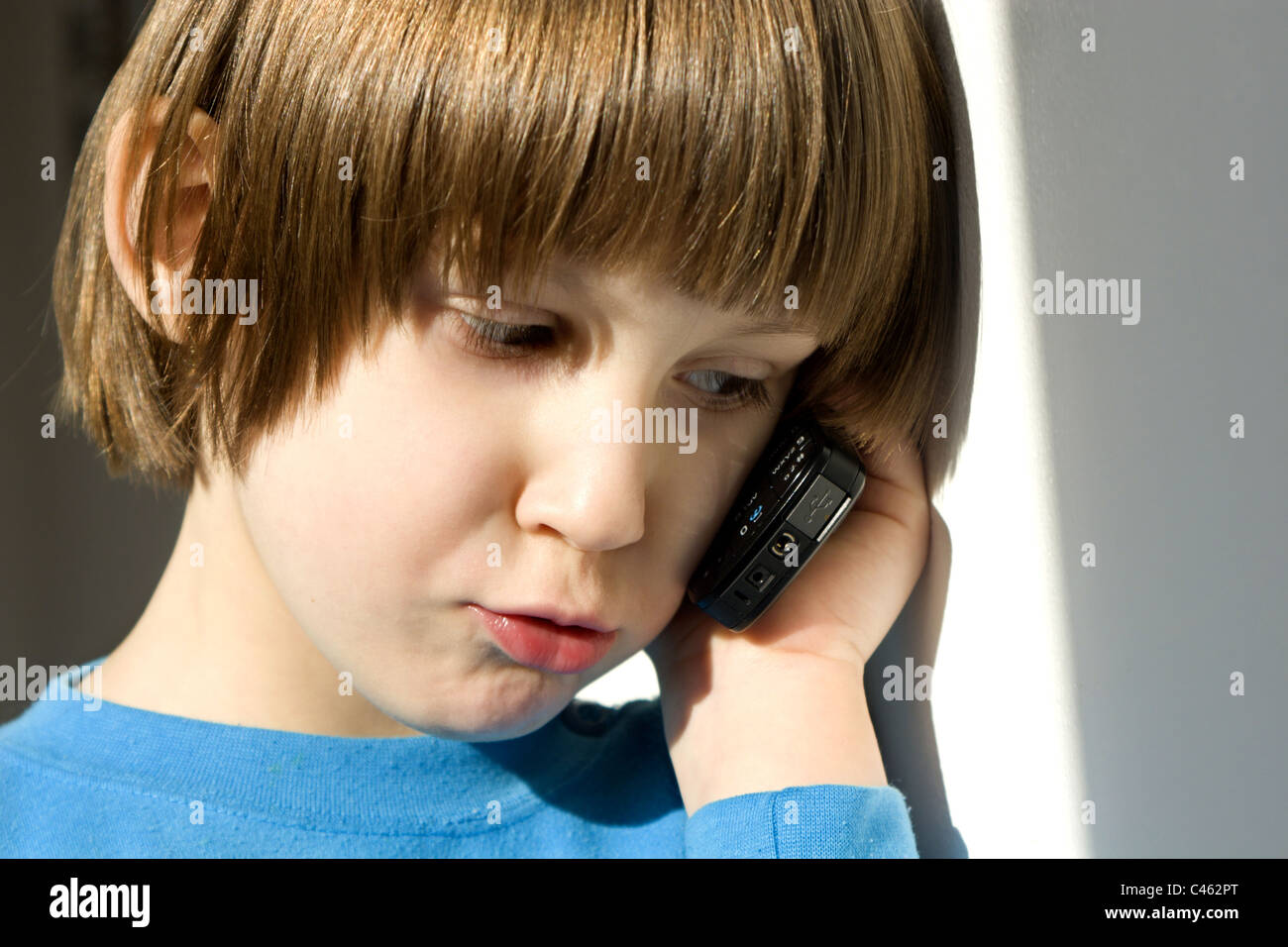 little girl by calling Stock Photo