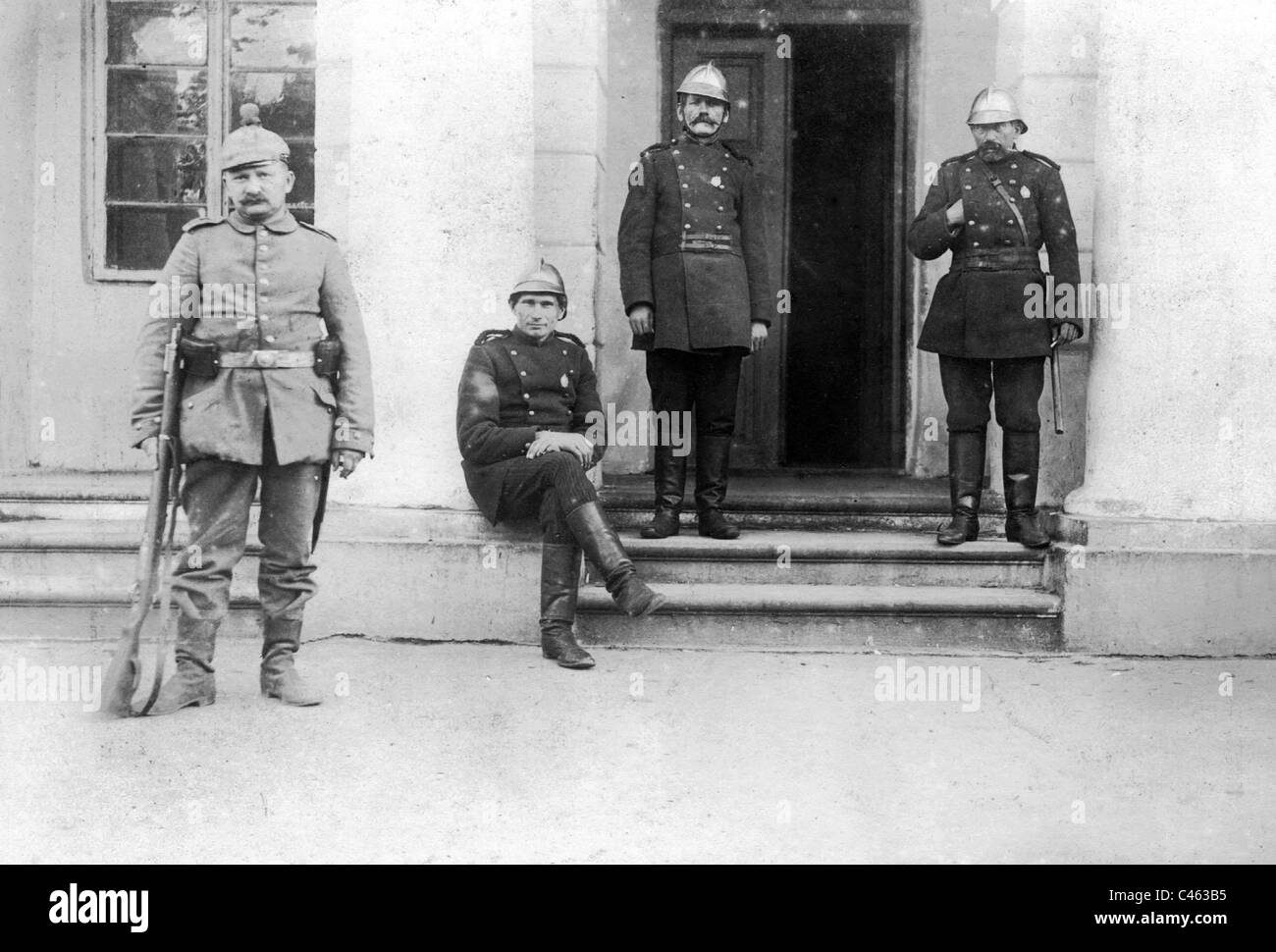 Soldier and Russian fire-fighters in Suwalki, 1914 Stock Photo