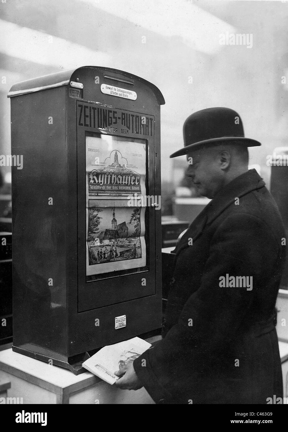 Newspaper vending machine, 1929 Stock Photo Alamy