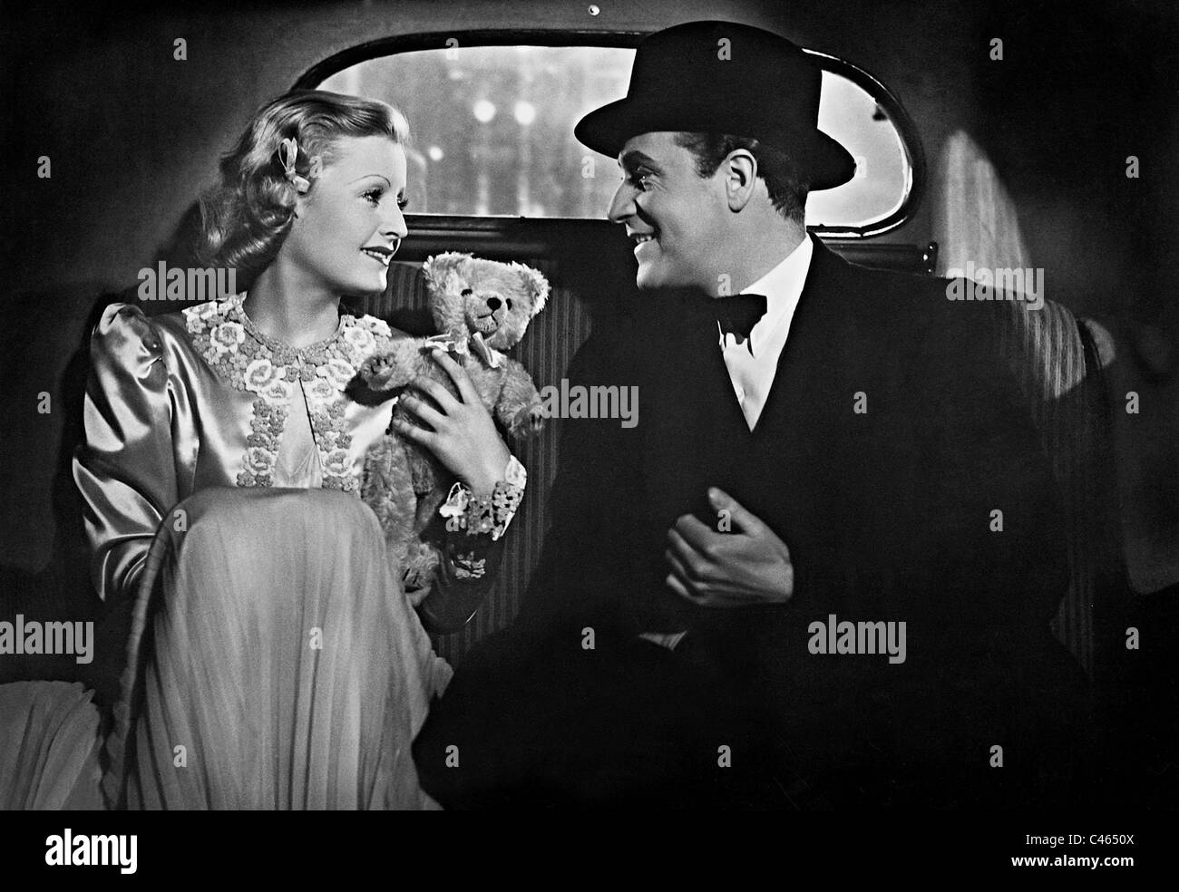 Lilian Harvey and Willy Fritsch in 'Frau am Steuer', 1939 Stock Photo