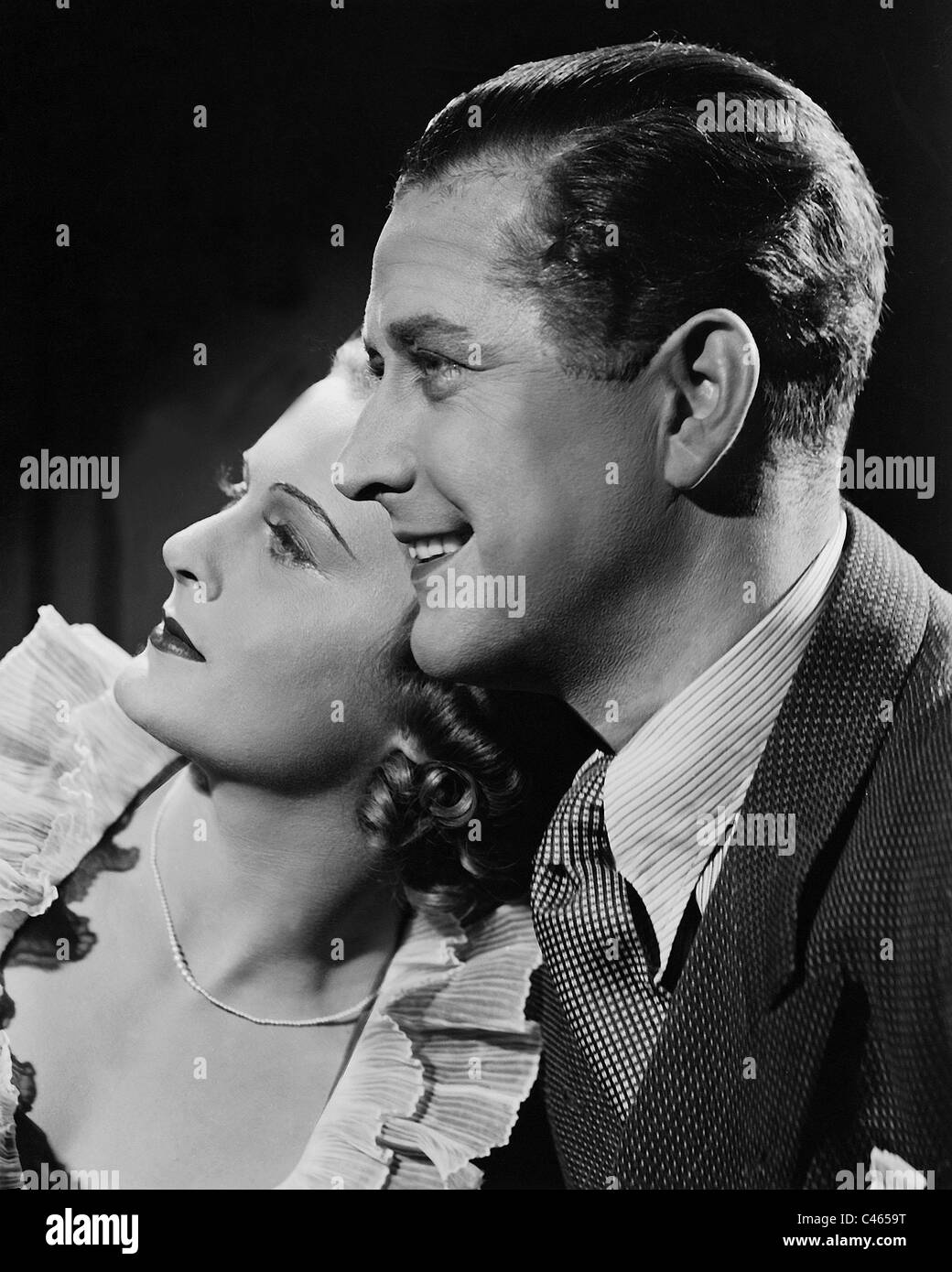 Marika Roekk and Hans Soehnker in 'Und Du mein Schatz faehrst mit', 1937 Stock Photo