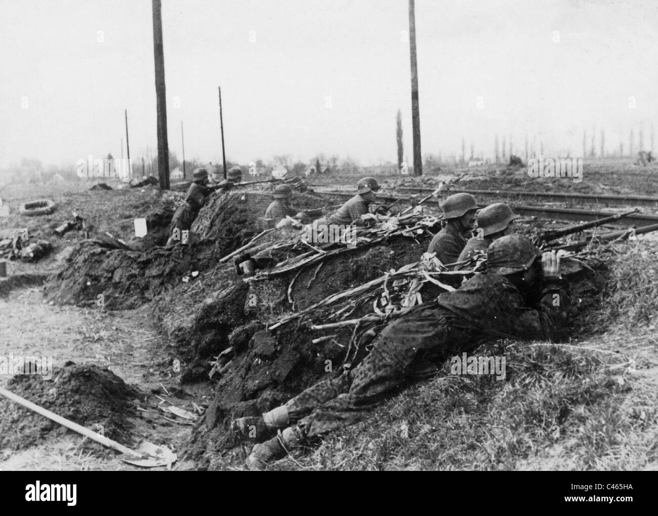 SS Panzer Grenadiers in a Hungarian railway embankment, 1945 Stock Photo