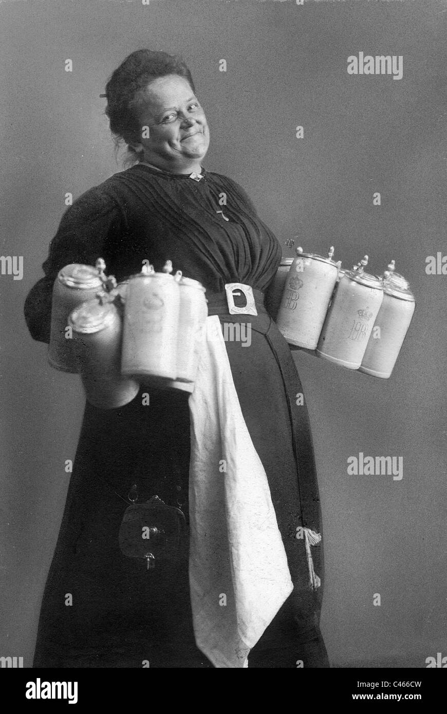 A waitress from Munich, 1909 Stock Photo