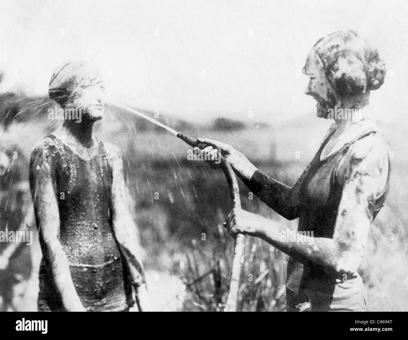 Shower after the mud bath, 1923 Stock Photo