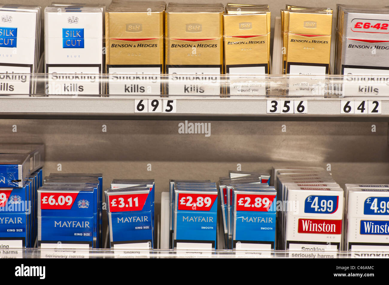 Cigarette Display Behind A Shop Counter Stock Photo