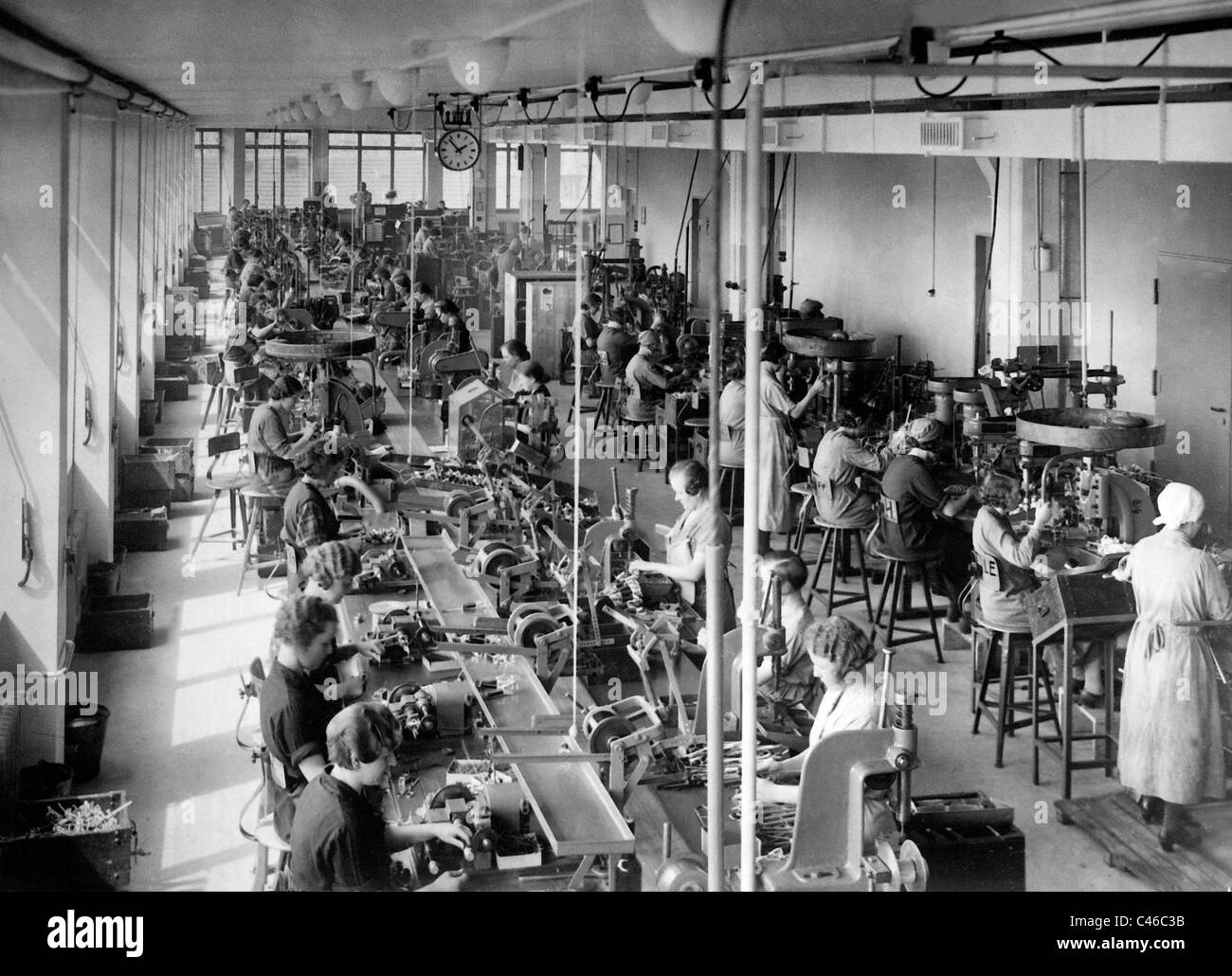 Assembly line work at Bosch, 1936 Stock Photo - Alamy