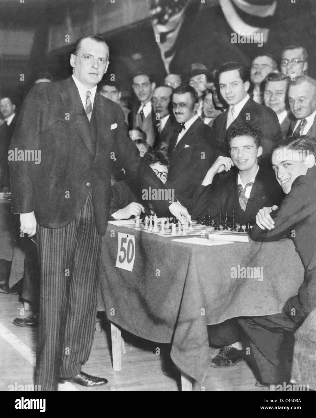 Alexander Alekhine playing simultaneous chess, 1926 Stock Photo - Alamy