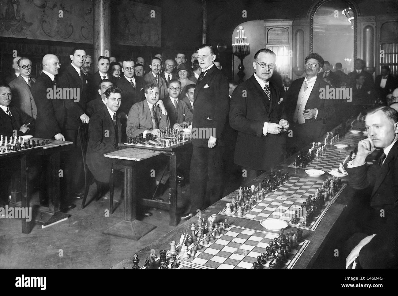 Alexander Alekhine playing simultaneous chess, 1926 Stock Photo - Alamy