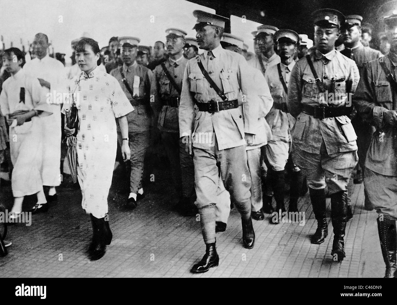 Chiang Kai-shek with wife and military escort, 1928 Stock Photo