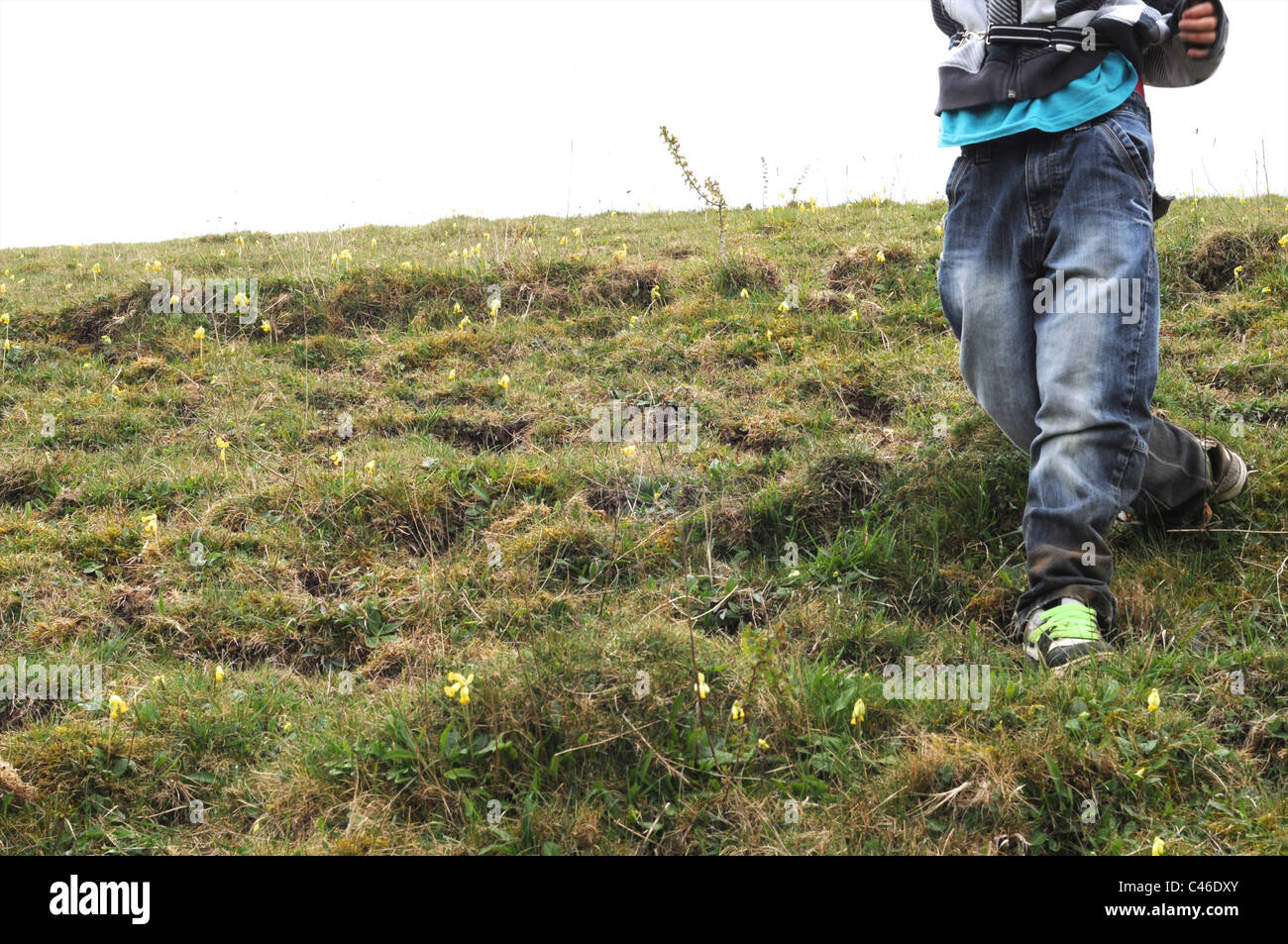 Boy on hillside Stock Photo