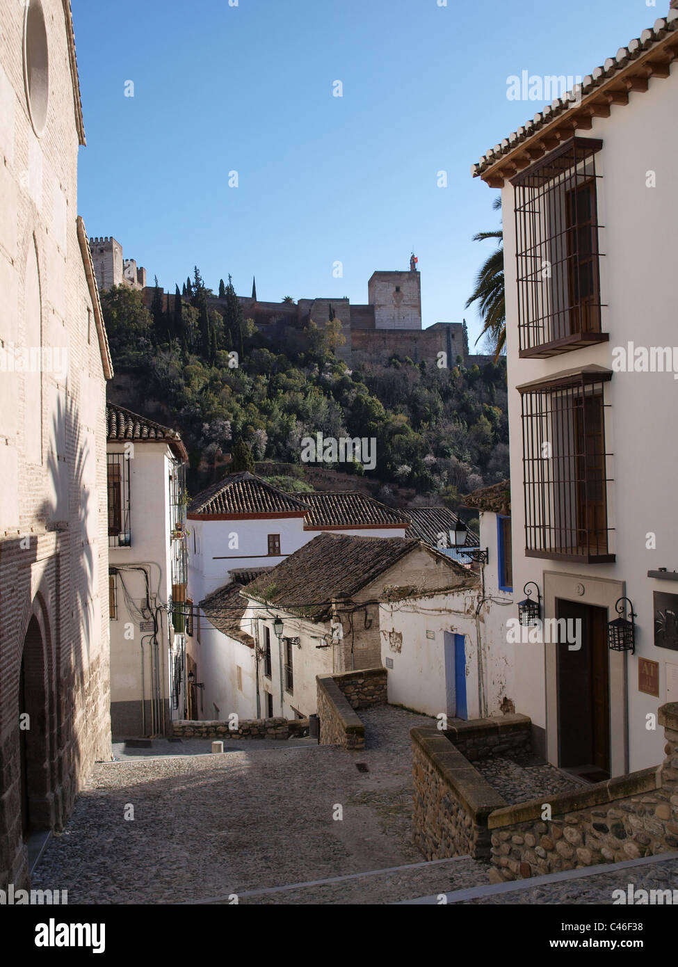 A view over the Alhambra from the old residential streets of Granada, Spain Stock Photo