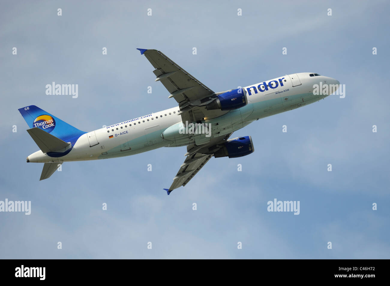 airplane Airbus A320 of german airline Condor Thomas Cook at takeoff