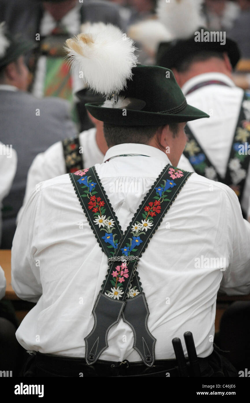 Man in traditional bavarian costume with leather trousers and white shirt, Bavaria, Germany Stock Photo