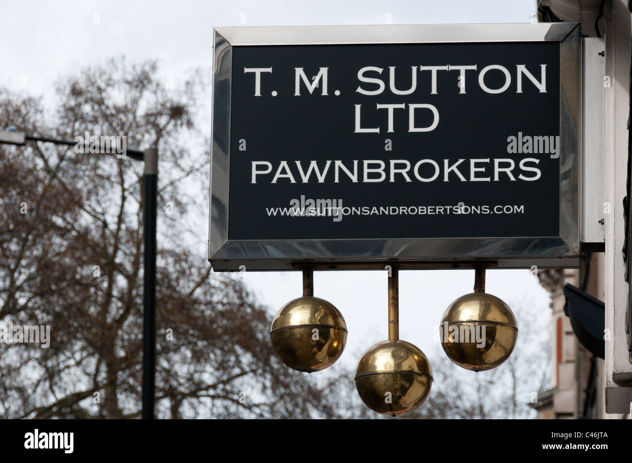 T M Sutton Ltd Pawnbrokers sign Stock Photo