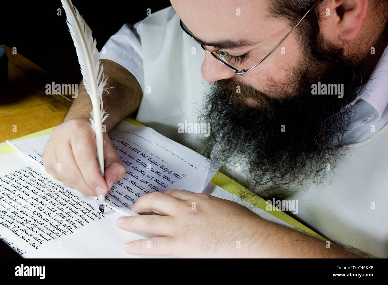 Photograph of an Orthodox Jew doing the work of copyist of the scriptures Stock Photo