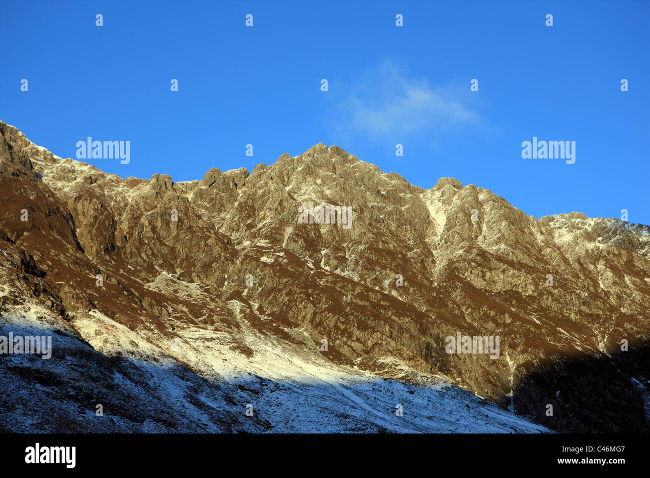Aonach Eagach Ridge in Glen Coe against a blue sky Stock Photo - Alamy