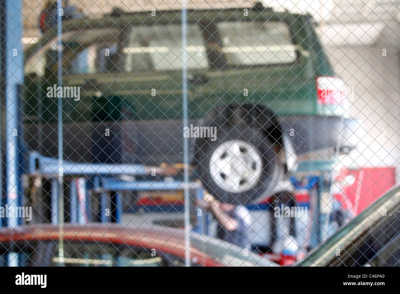 Garage car lift hi-res stock photography and images - Alamy