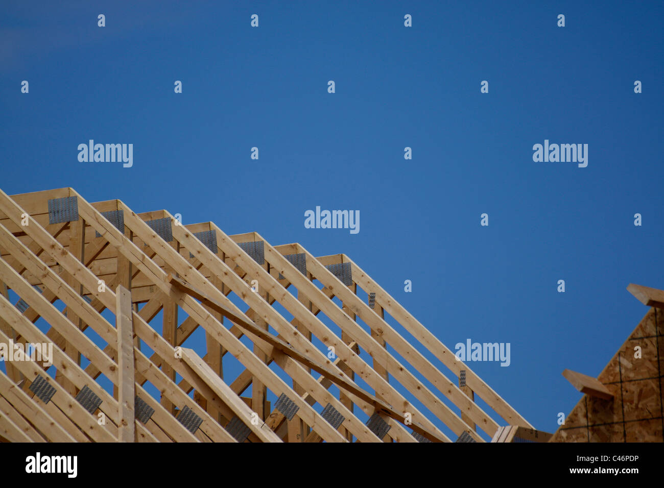 Truss rafters on new home construction Stock Photo