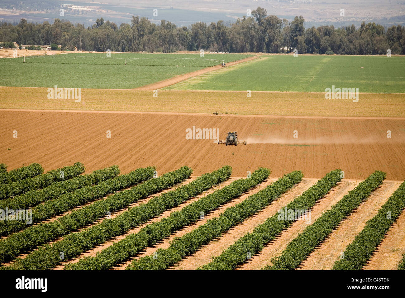 Aerial photograph of a tractor plowing a field in the Upper Galilee Stock Photo