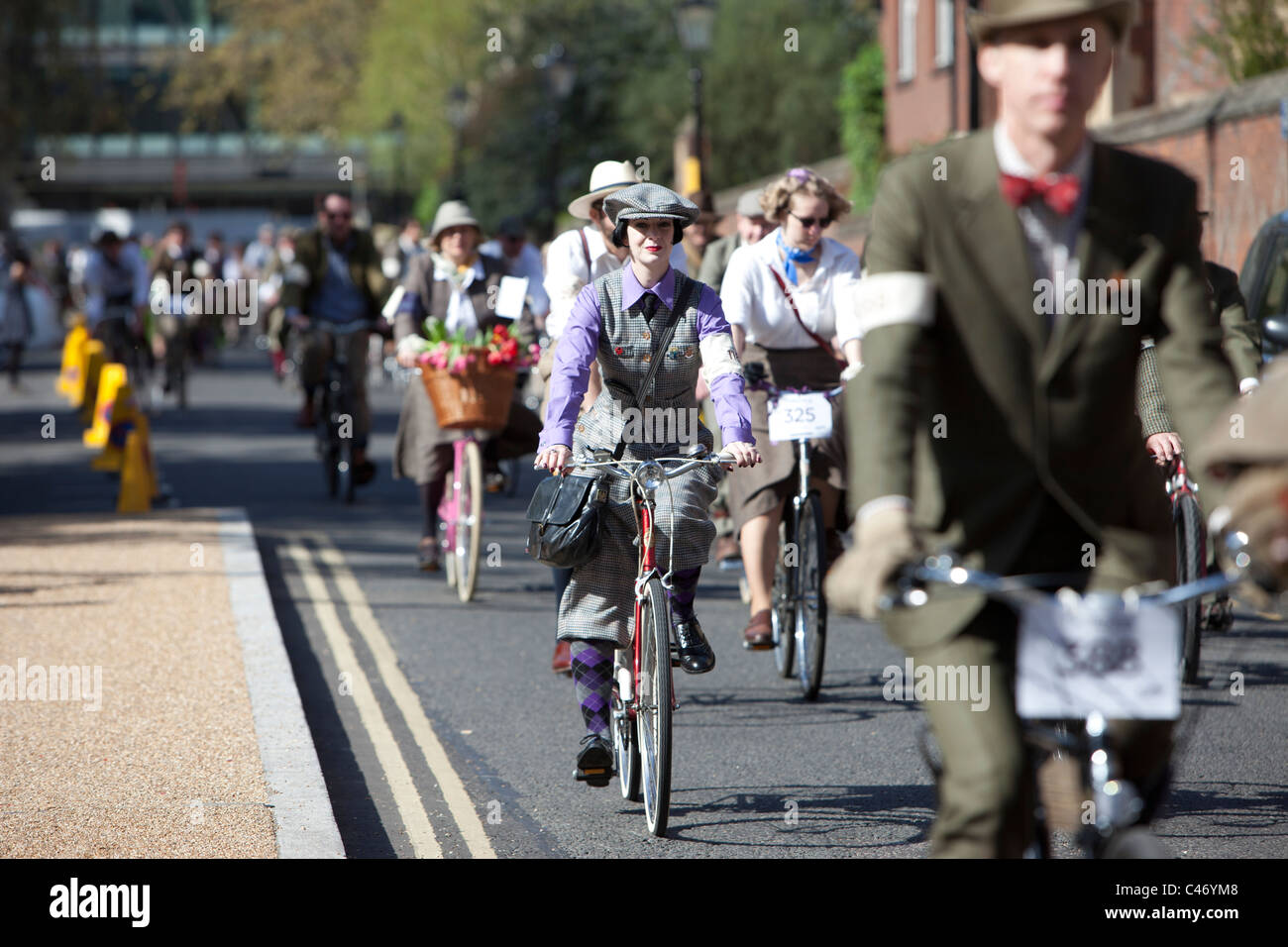 The Tweed Run, London, UK, 11th April 2011: participants ride past Old Street roundabout towards Hackney Stock Photo
