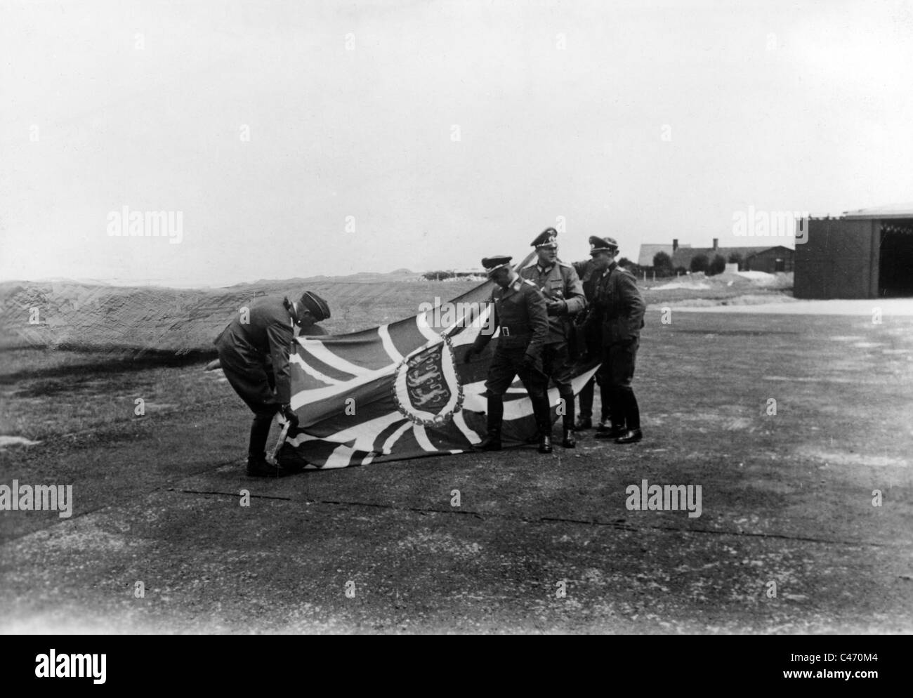 Taking down the British service flag on Jersey, 1940 Stock Photo