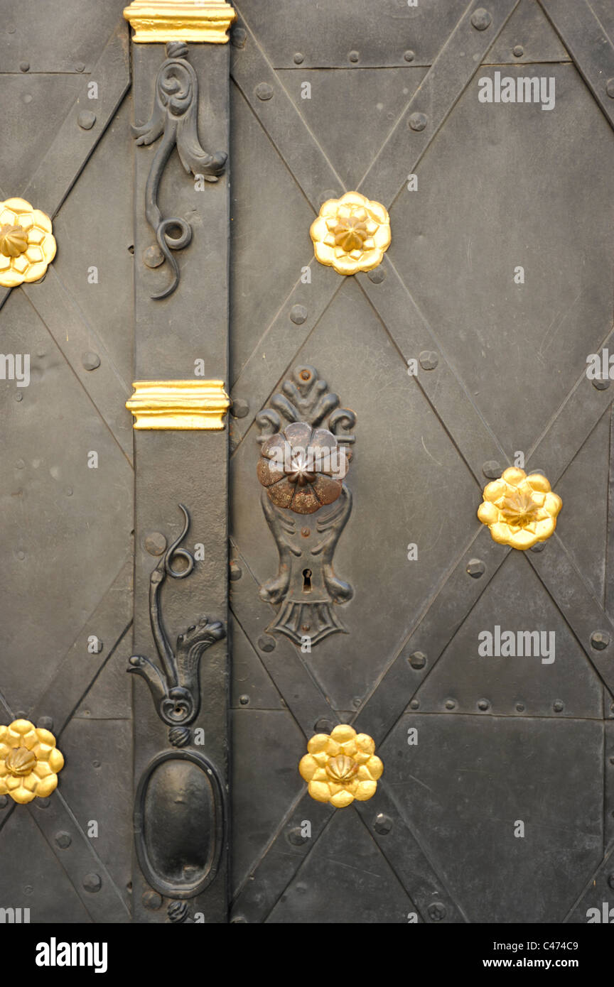 Door knockers and Door furniture on doors in the Czech capital of Prague Stock Photo