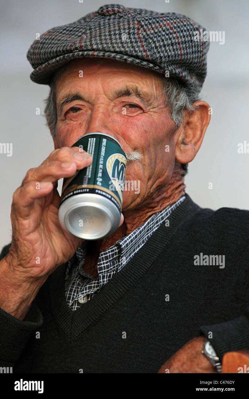 Old men drinking beer hi-res stock photography and images - Alamy