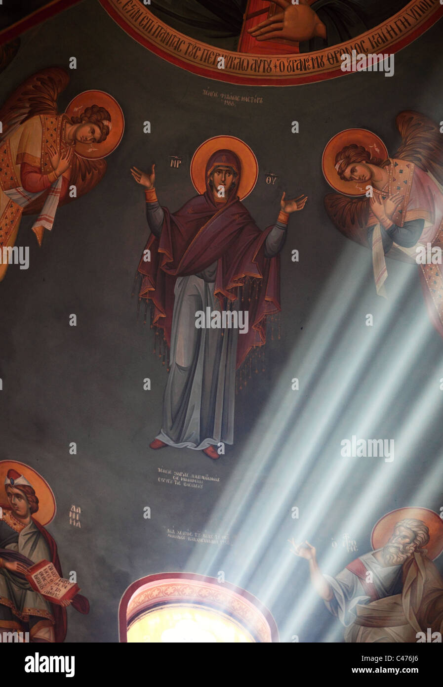 Orthodox painting with rays of light in a church in Kefalos Kos Greece Stock Photo