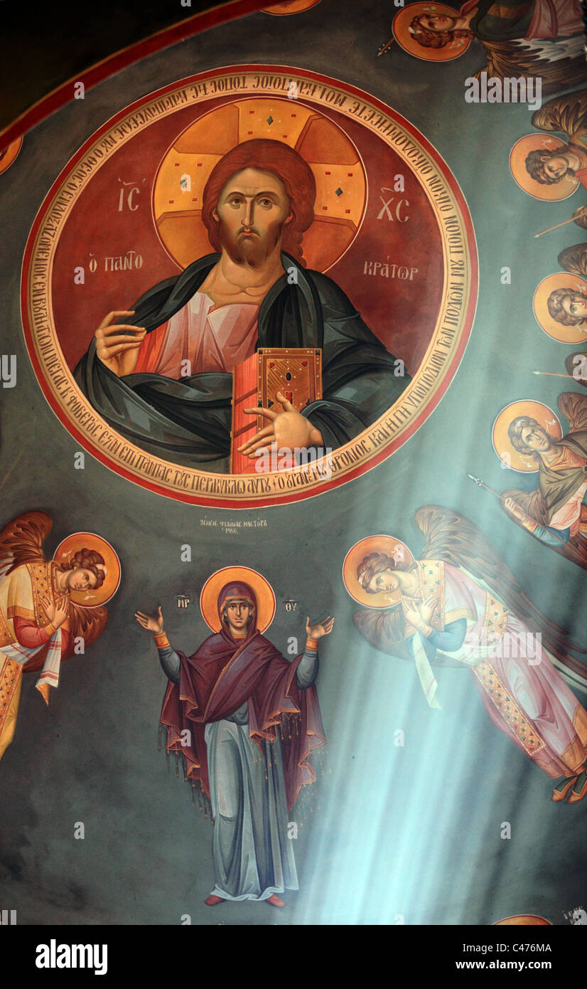 Orthodox painting with rays of light in a church in Kefalos Kos Greece Stock Photo
