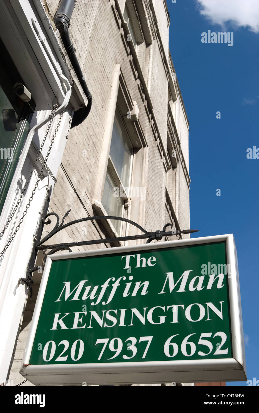 hanging sign for the muffin man tea shop, kensington, london, england
