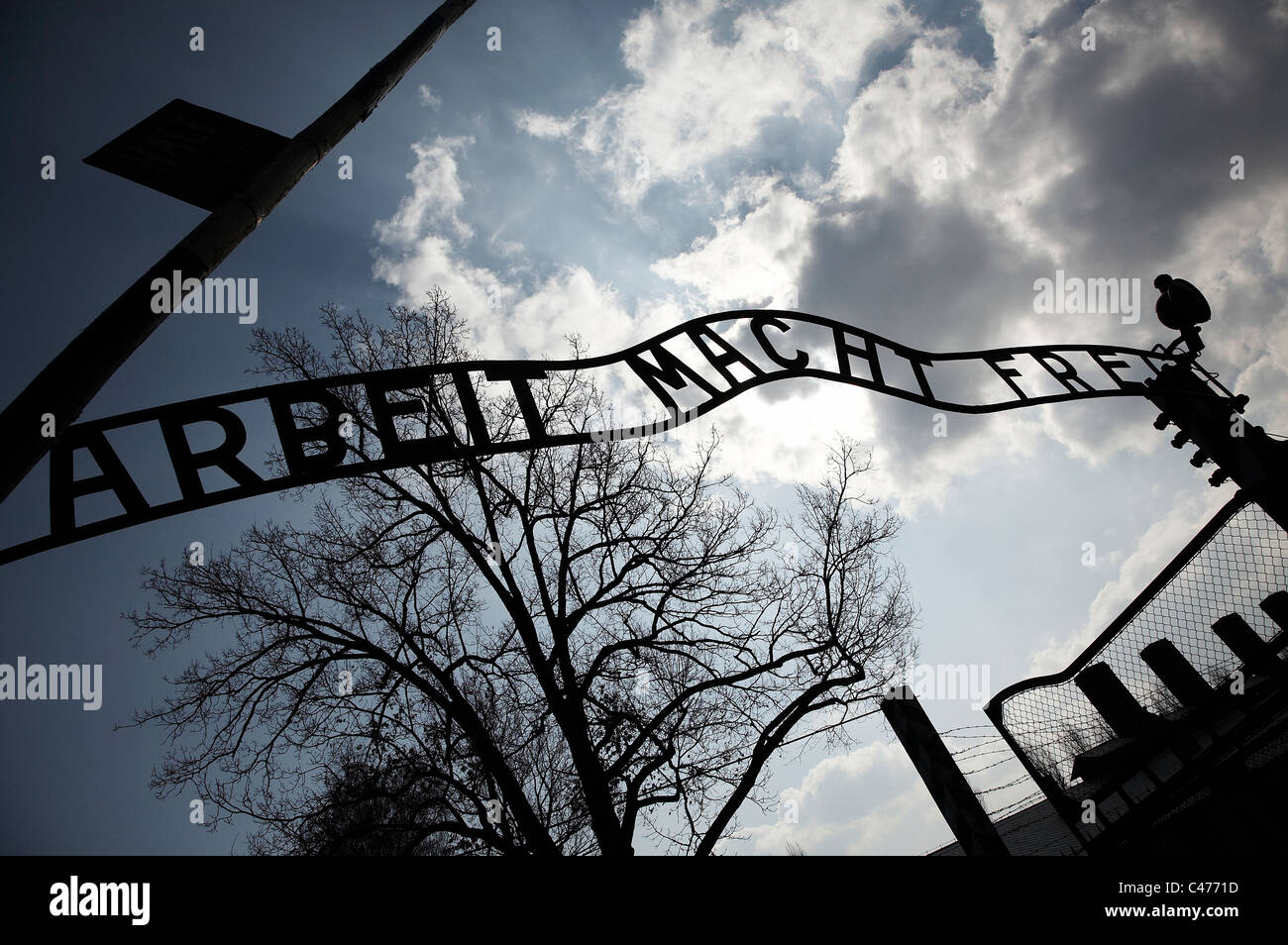 The infamous entrance sign at Auschwitz before it was stolen and damaged. Arbeit Macht Frei - 'Works sets you free' Stock Photo
