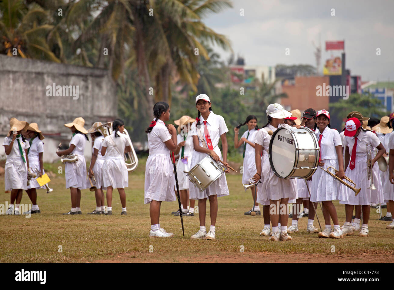 school girls in uniform, members of a marching band during a parade in Galle, Sri Lanka Stock Photo