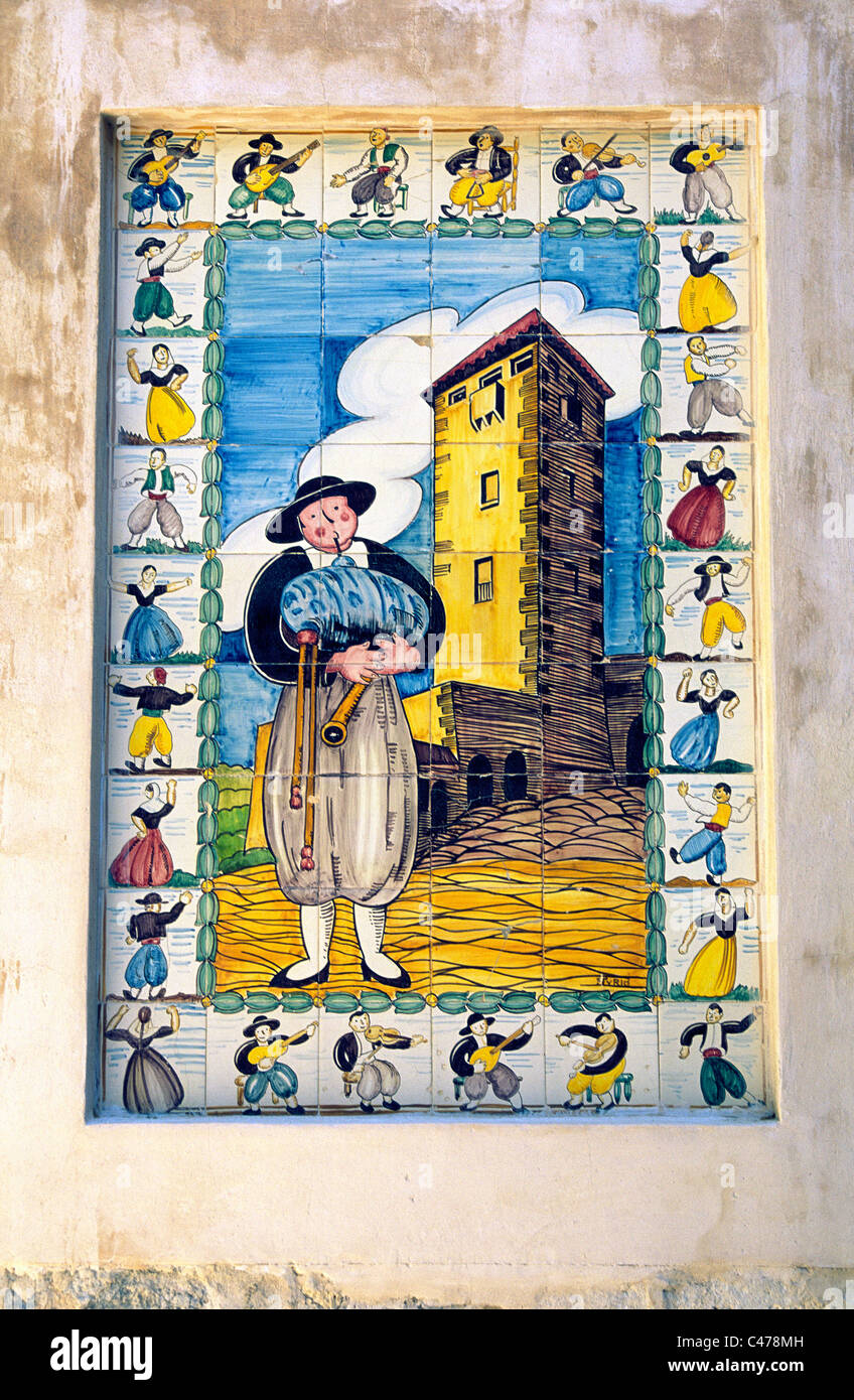 Typical local folk art ceramic picture tile outside house in Port de