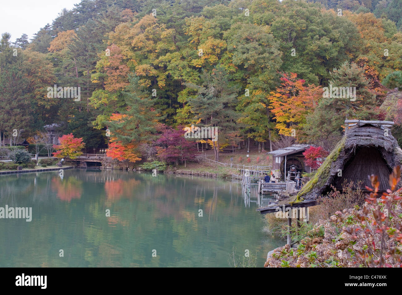 Autumn Foliage Pond And Water Wheel At Hida No Sato Photo Inspiration