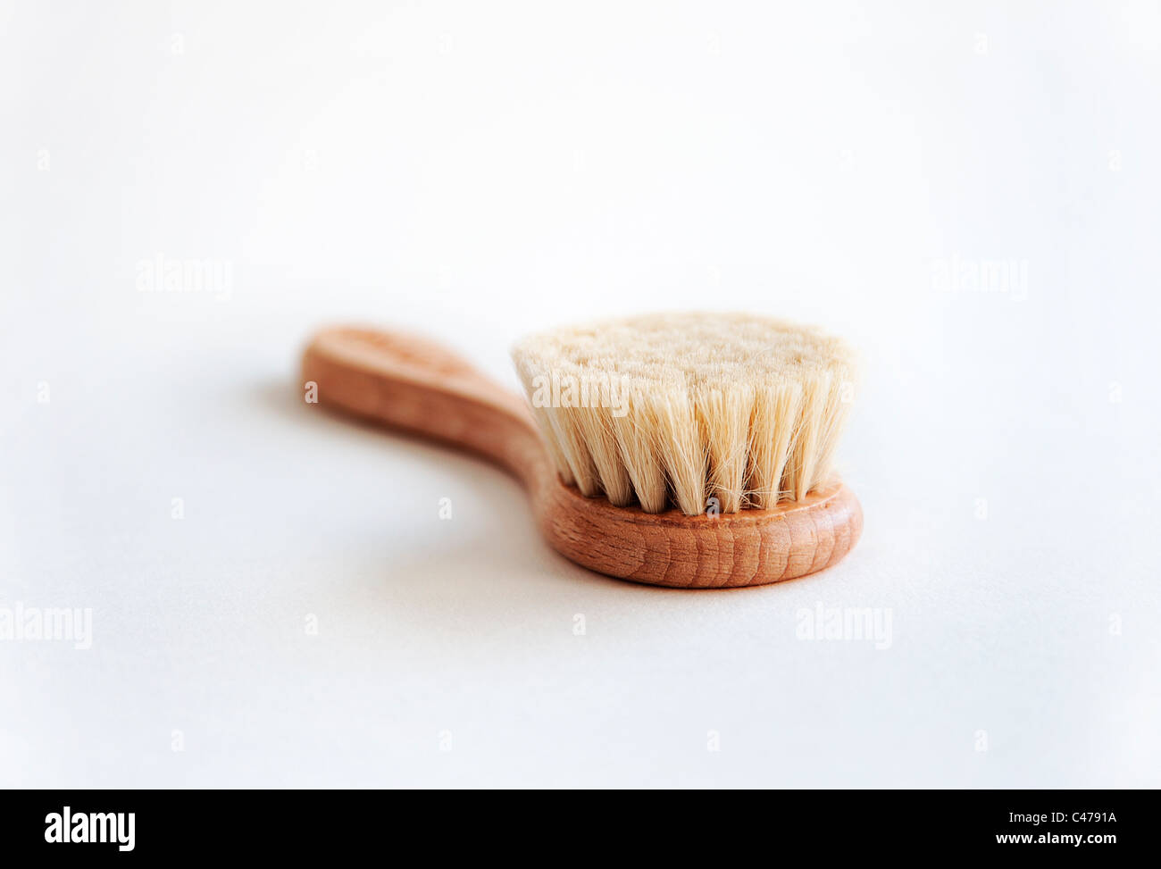 Hand with bristle brush hires stock photography and images Alamy