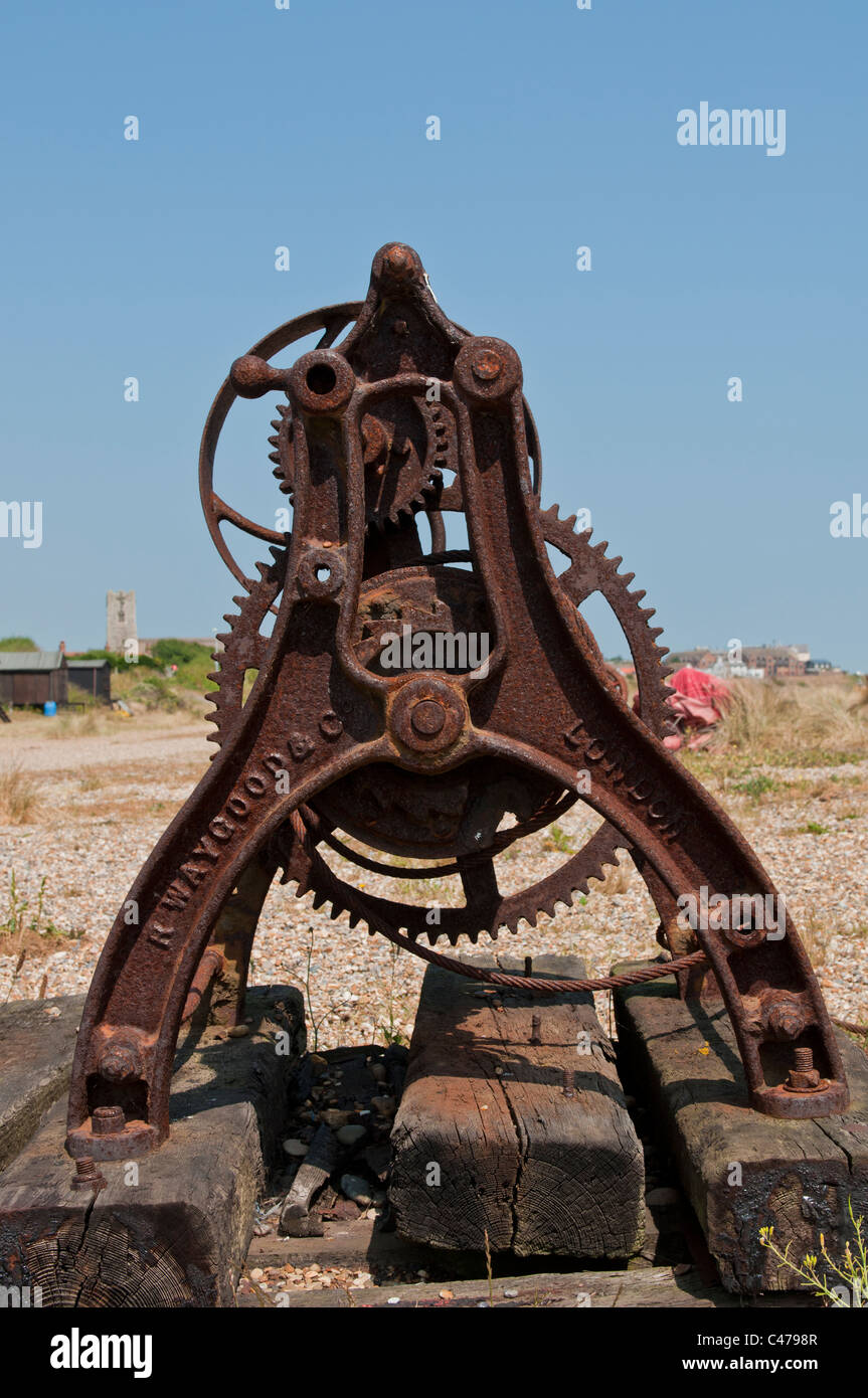 Fishing boat winch on wooden railway sleepers UK boats Stock Photo