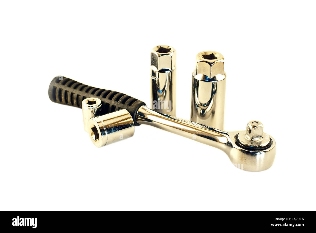 A ratchet wrench with sockets isolated on a white background Stock