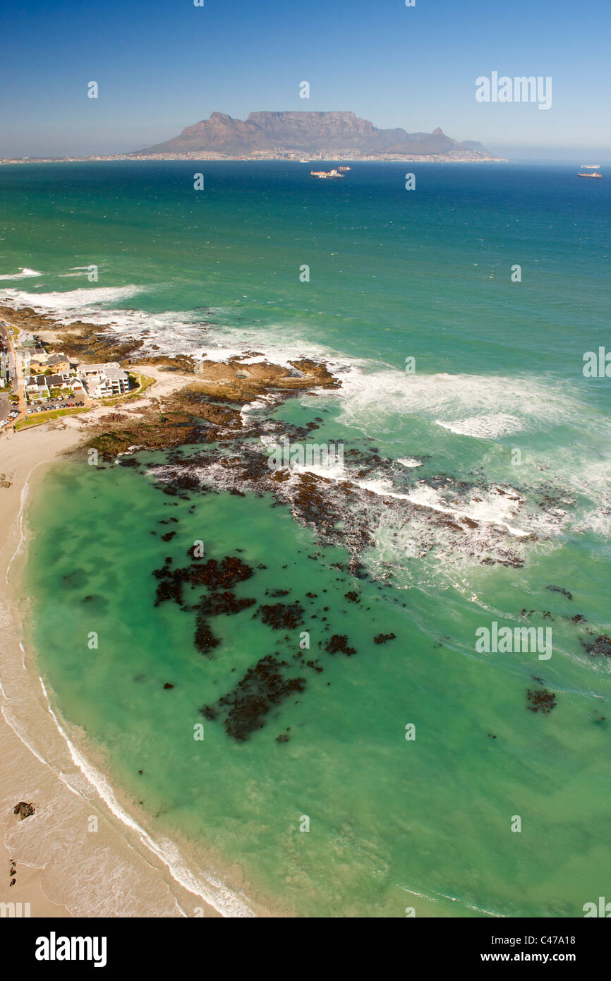 Aerial view of Big Bay on the west coast north of Cape Town in South Africa. Table Mountain is visible in the background. Stock Photo