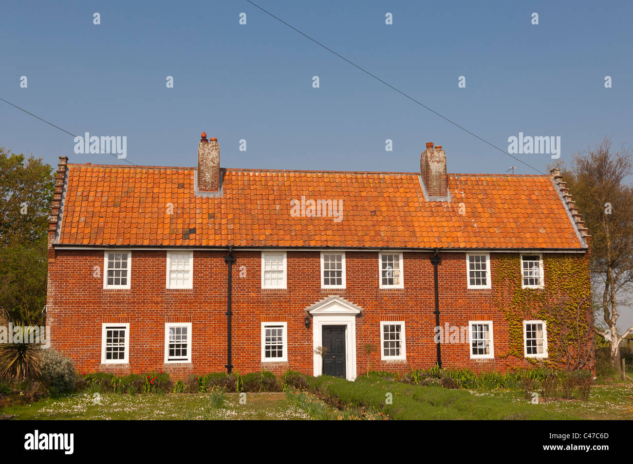 A red brick house at Walberswick in Suffolk , England , Britain , Uk Stock Photo