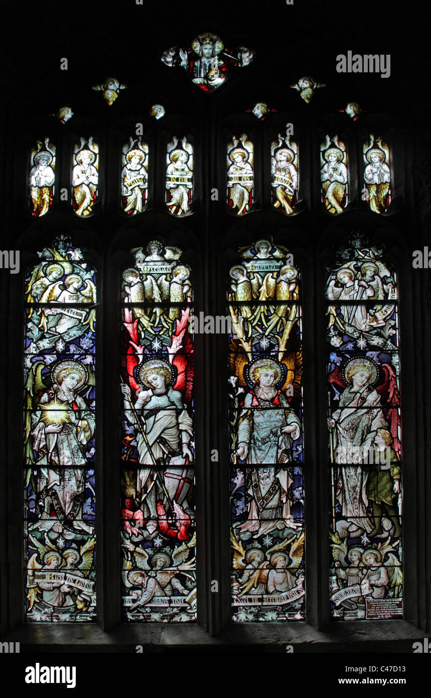 A stained glass window by John Hardman & Co. depicting Four Archangels Stock Photo