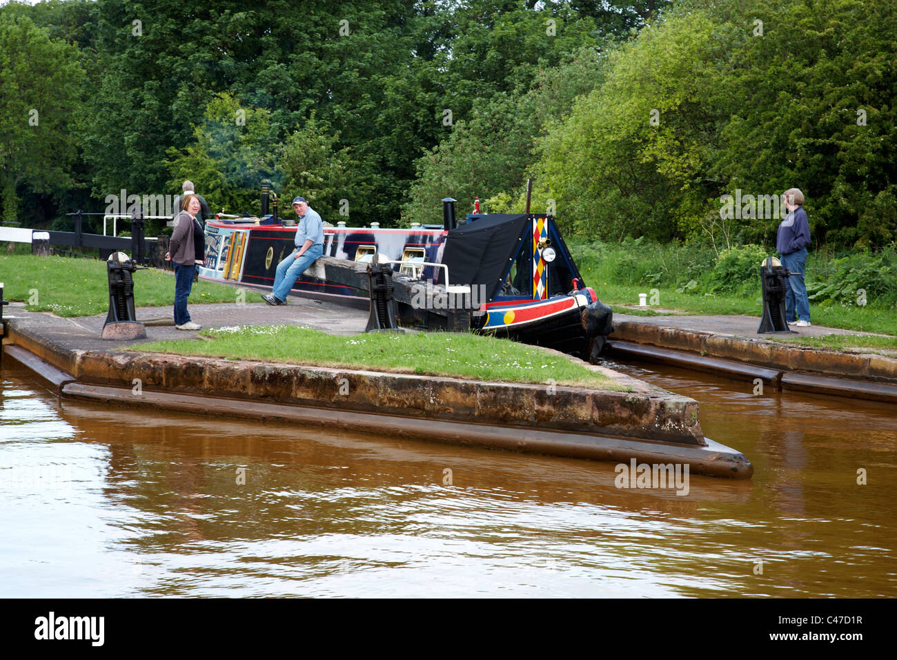 Narrow boat at Lawton locks on the Trent and Mersey Canal in Cheshire UK Stock Photo