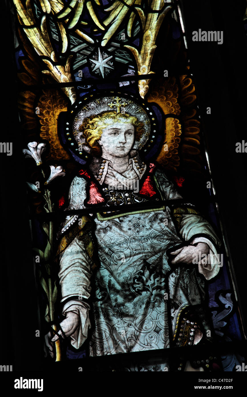 A stained glass window by John Hardman & Co. depicting The Archangel Gabriel, St Nicholas's Church, Tackley, Oxfordshire Stock Photo