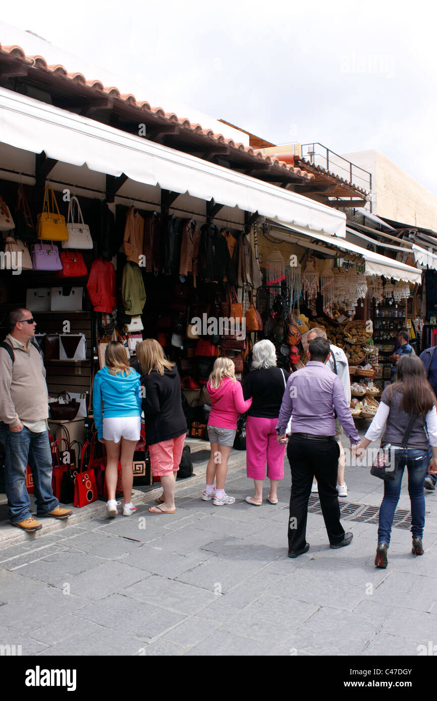 TOURISTS SHOPPING IN RHODES OLD TOWN. RHODES GREEK ISLAND Stock Photo