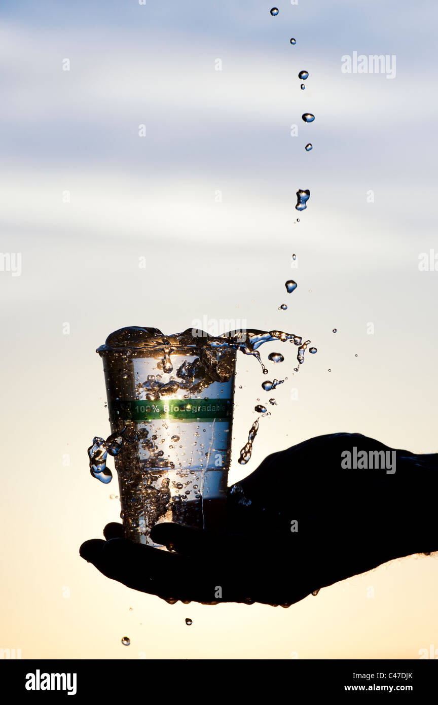 Pouring water into a Biodegradable, Compostable plastic free cup made