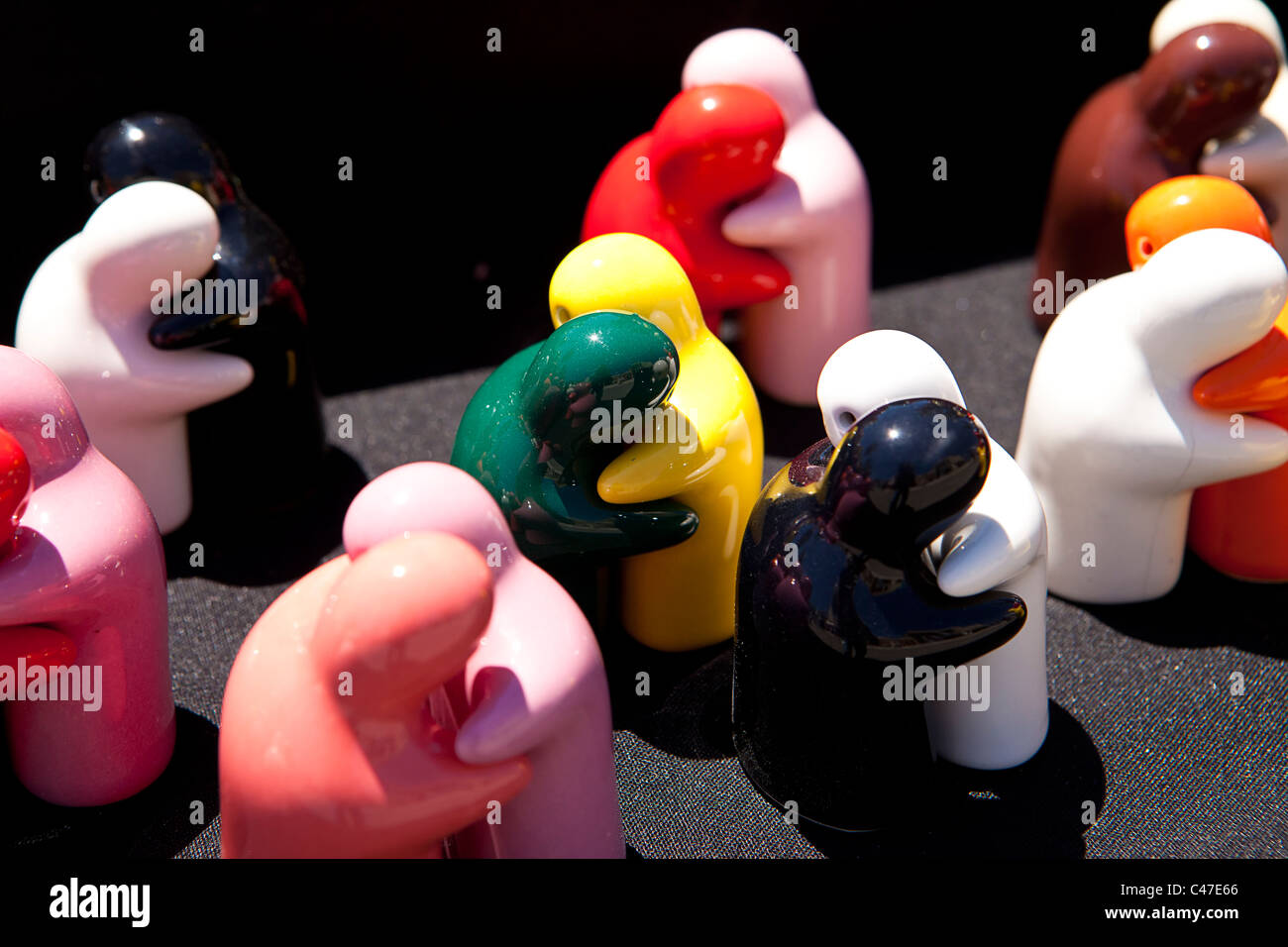 Figures hugging hi-res stock photography and images - Alamy