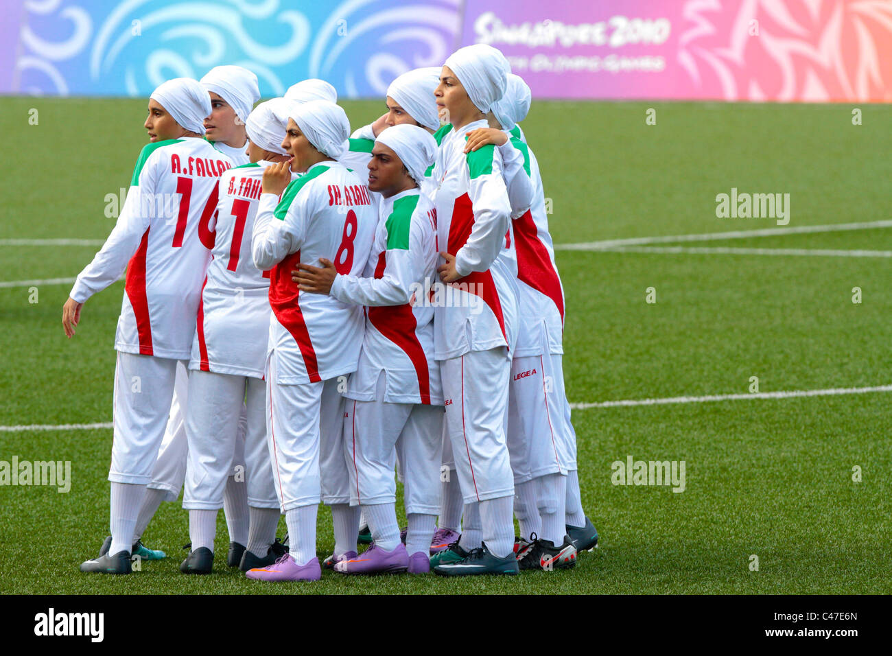 The Iranian team huddle together before the start of their match. Stock Photo