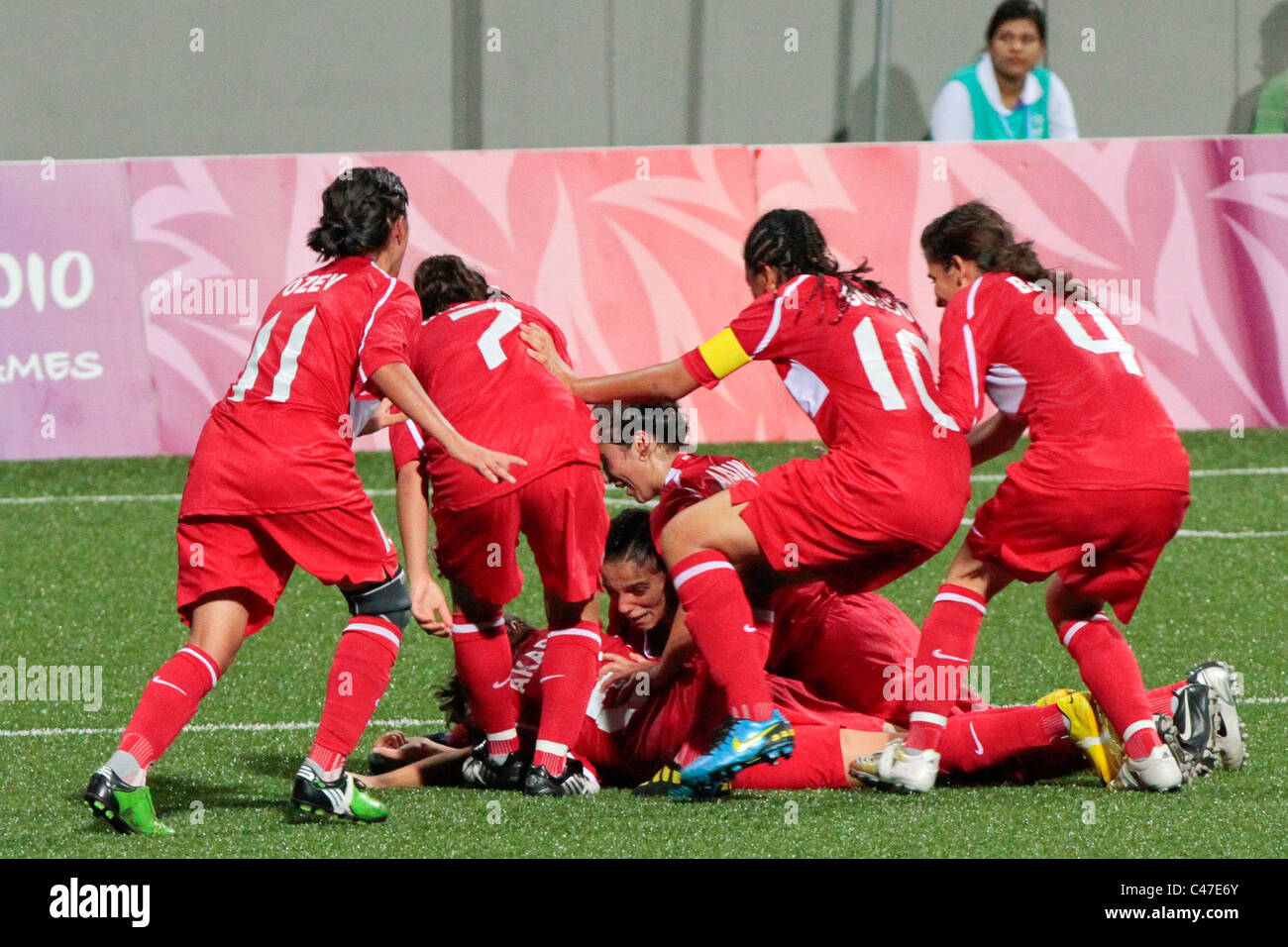 Turkish players celebrate after scoring their third goal of the match. Stock Photo