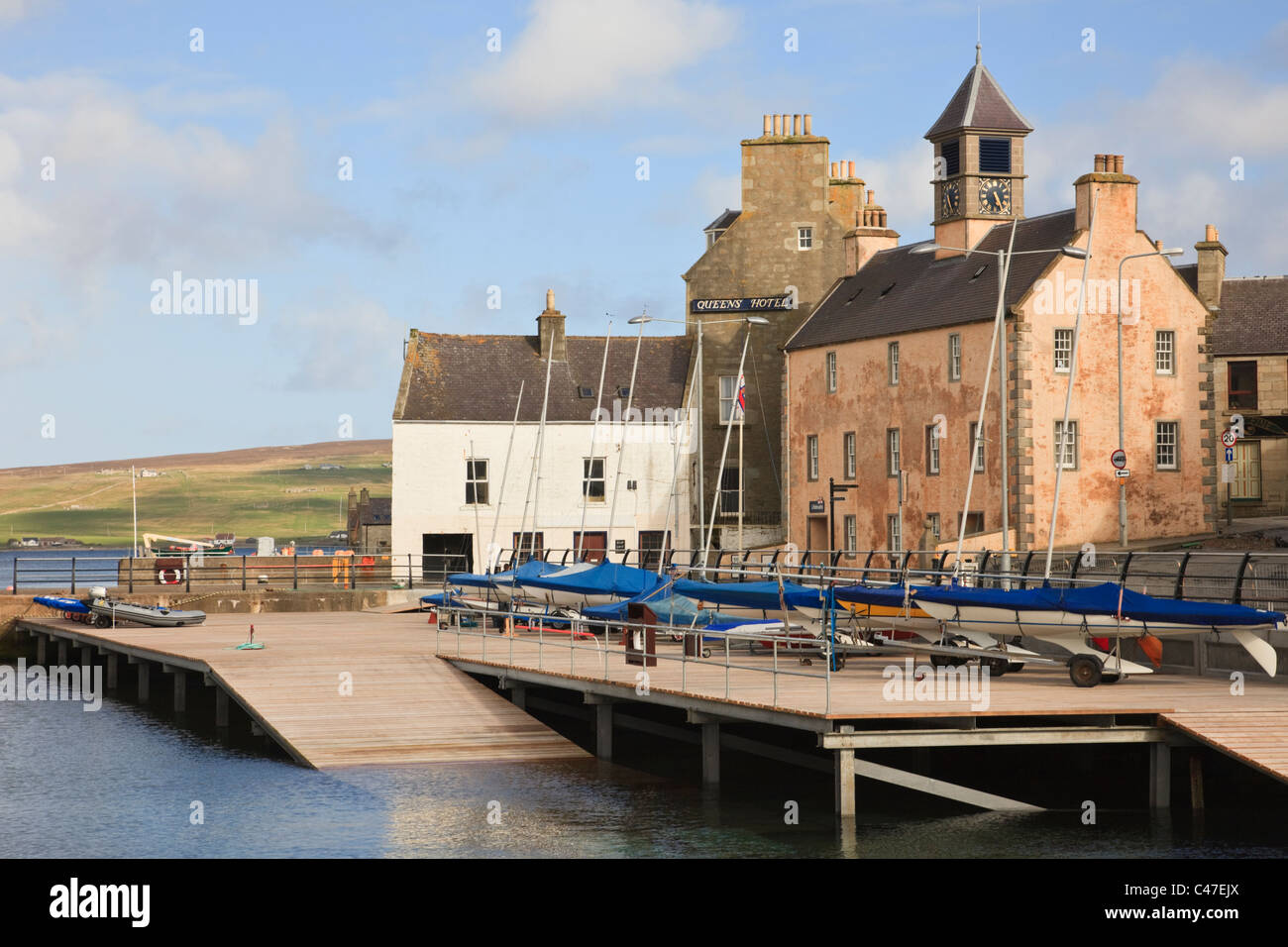 Lerwick, Shetland, Scotland, UK. New RNLI Lifeboat station by old Lifeboat Station in Hay's Lodberry on small boat harbour quay Stock Photo